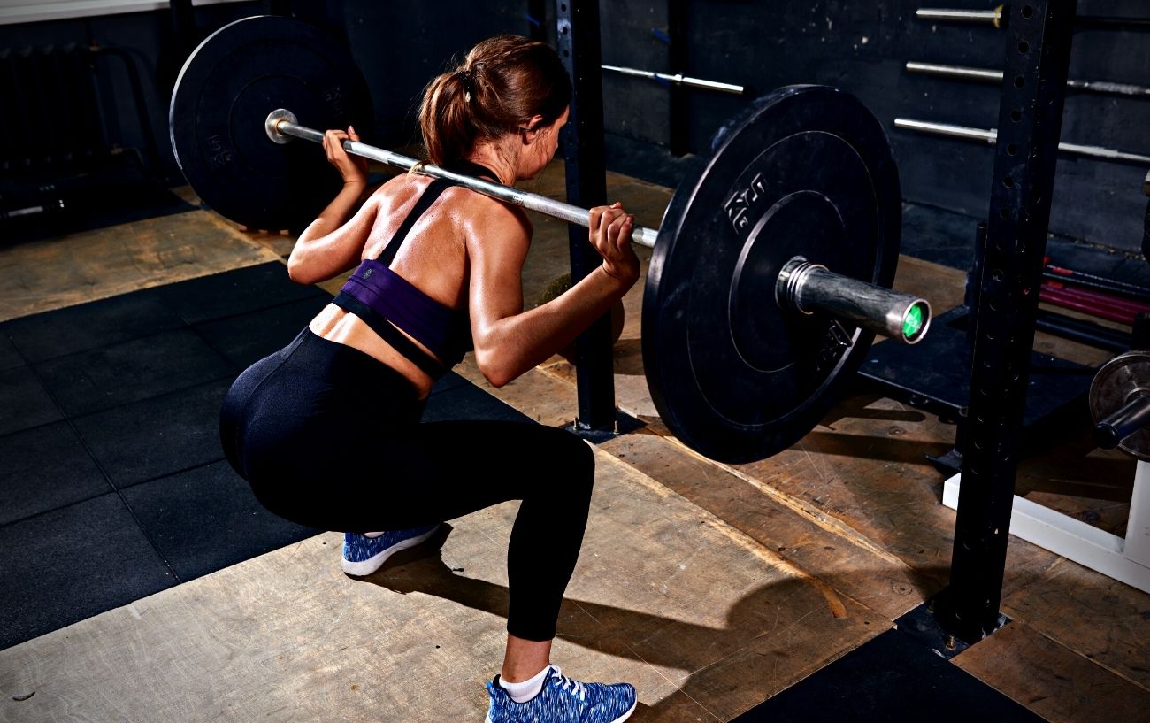 The 20 Rep Squat Program High Rep Squats Guide For Muscle Gain