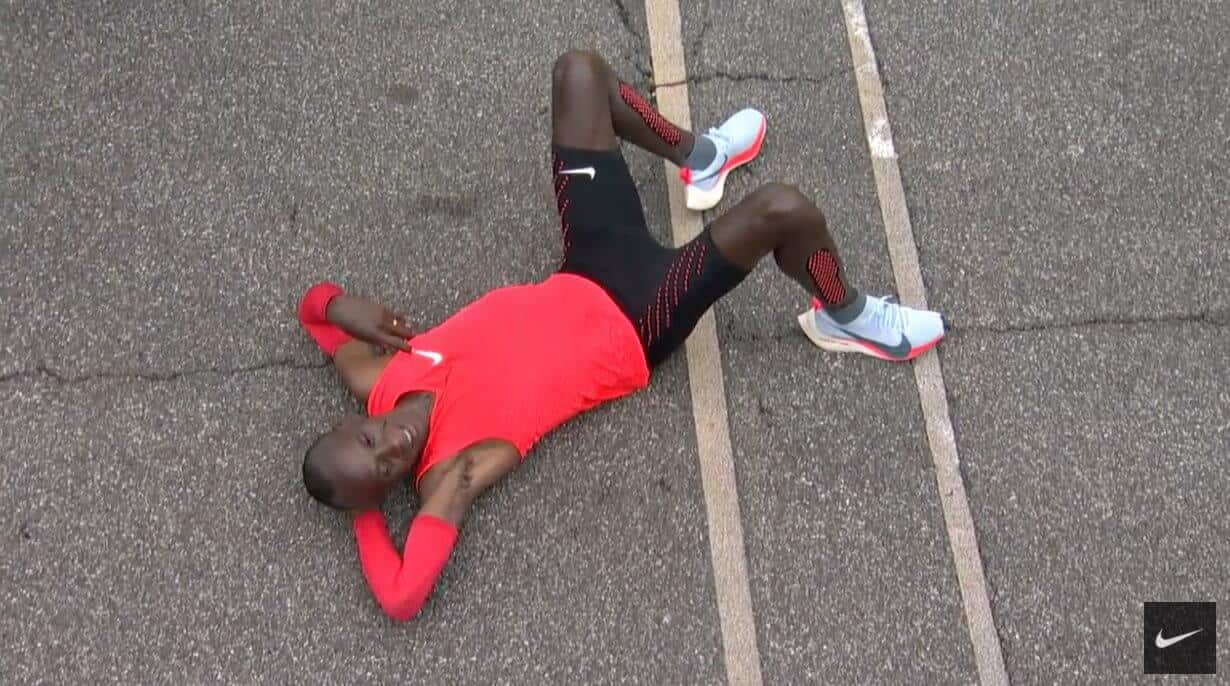 kipchogekipping a marathon runner lying resting on road