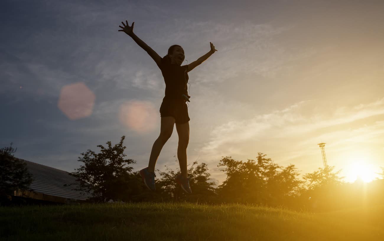 13 Things That Happen to Your Body When You Run a Marathon 7 a marathon lady jumping