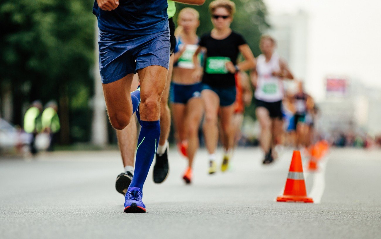 people's legs during a race