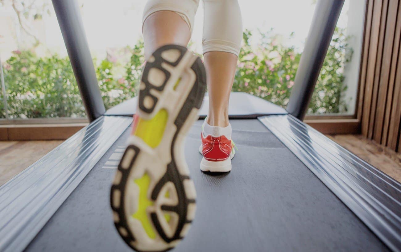 Woman's feet on treadmill.