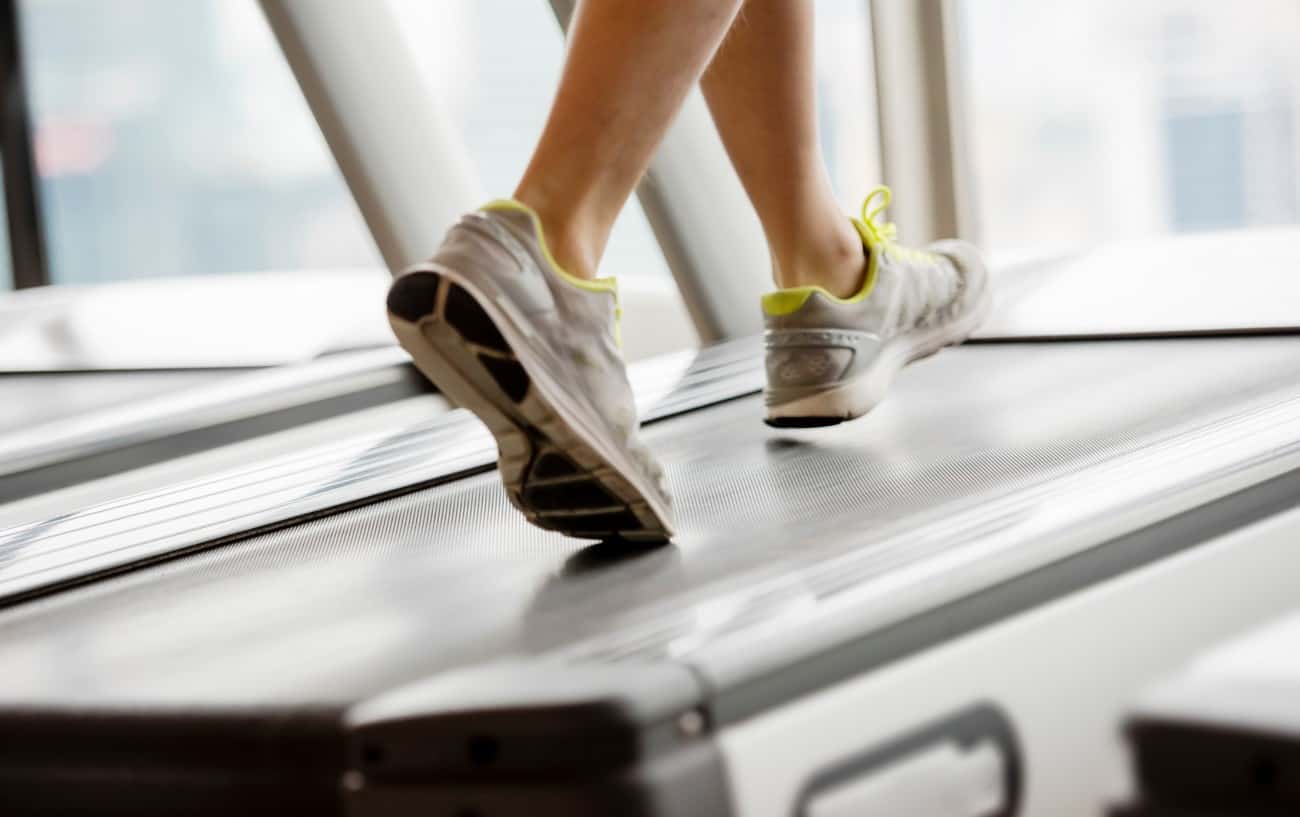 A person incline walking on a treadmill.