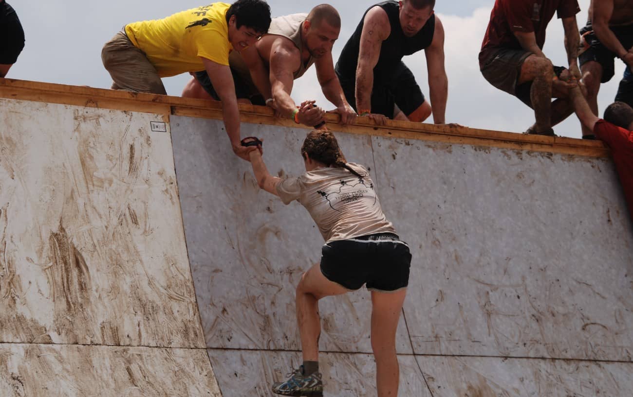 Someone climbing a wall.