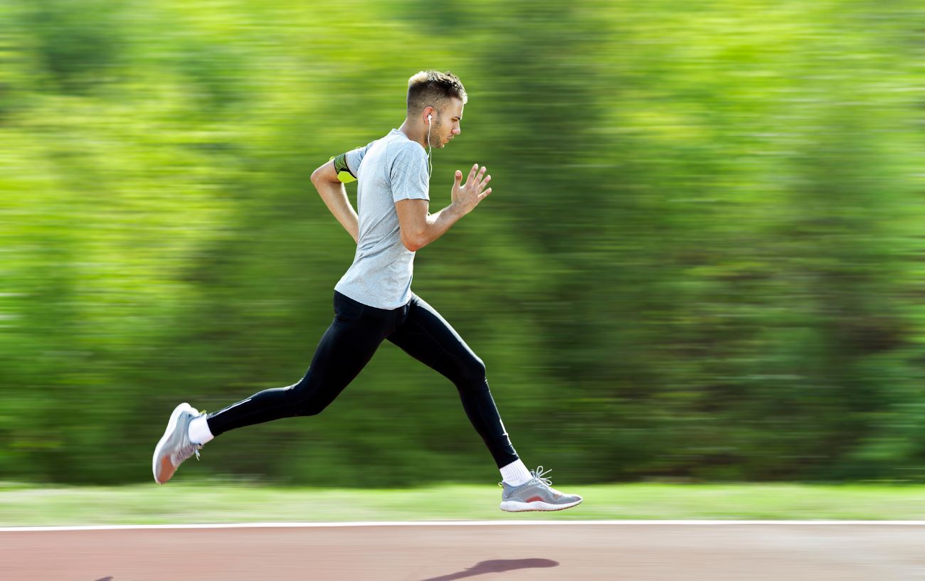 A person running using an advanced 5k training plan.