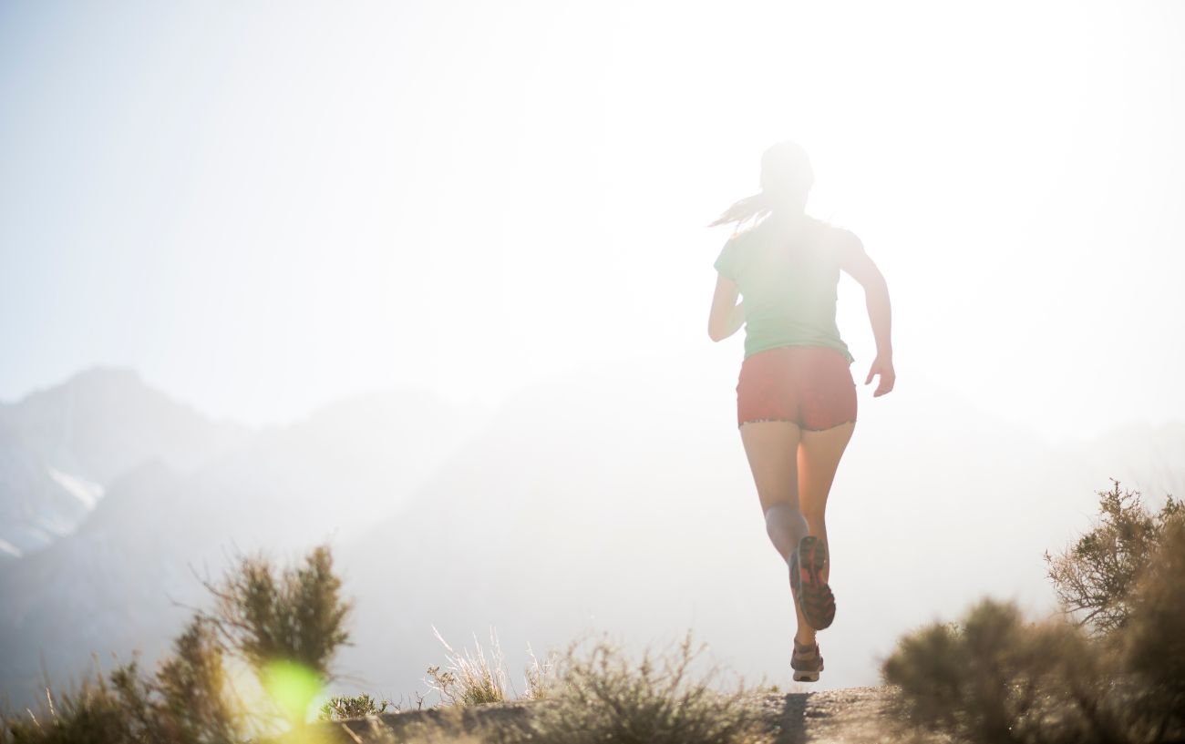 A person running trail.