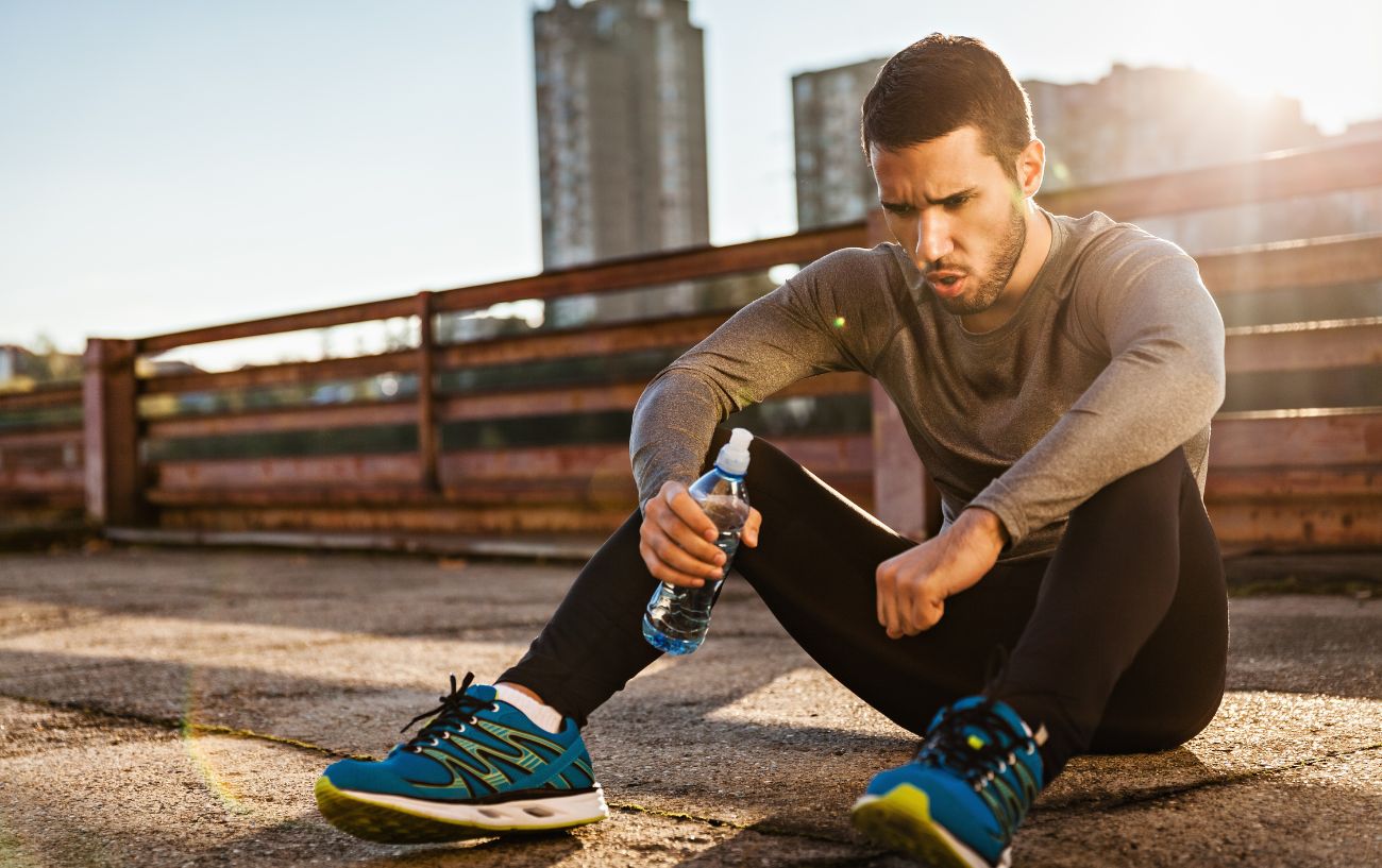 A person feeling lightheaded after a workout.