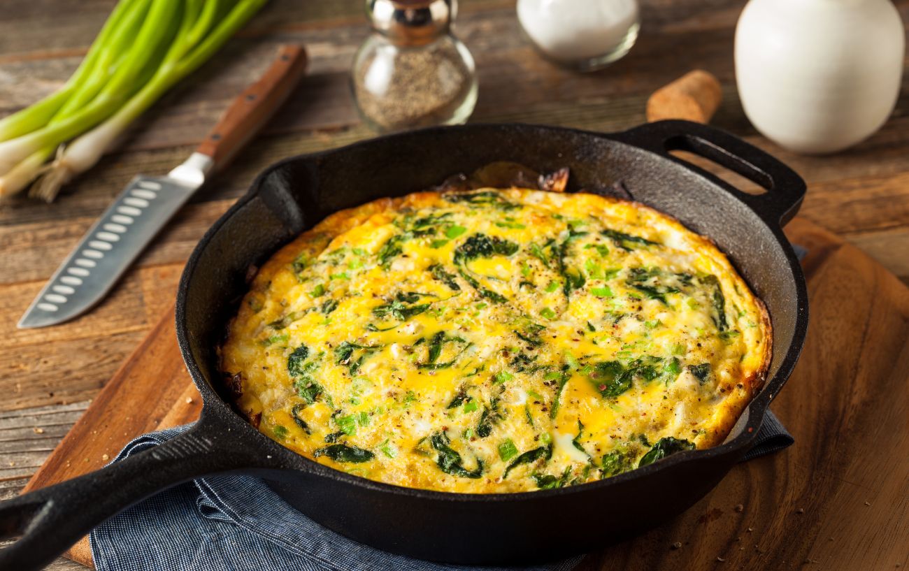 A vegetable frittata in a pan.