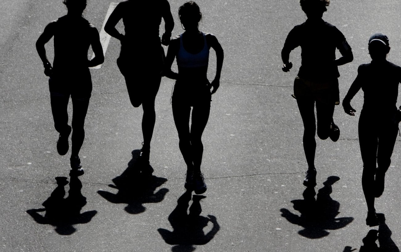 silhouettes of runners