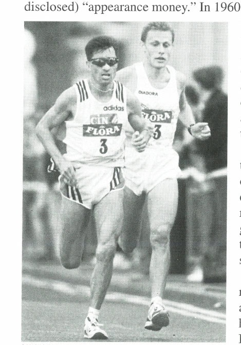 Antonio Pinto (number 3) and Stefano Baldini leading in the early miles of the 1997 Flora London Marathon.