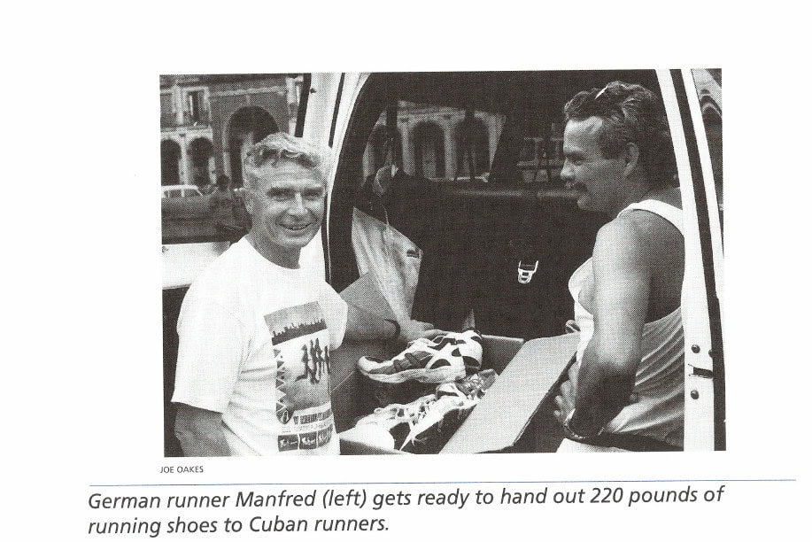 The Long Way Around 15 German runner Manfred (left) gets ready to hand out 220 pounds of running shoes to Cuban runners.