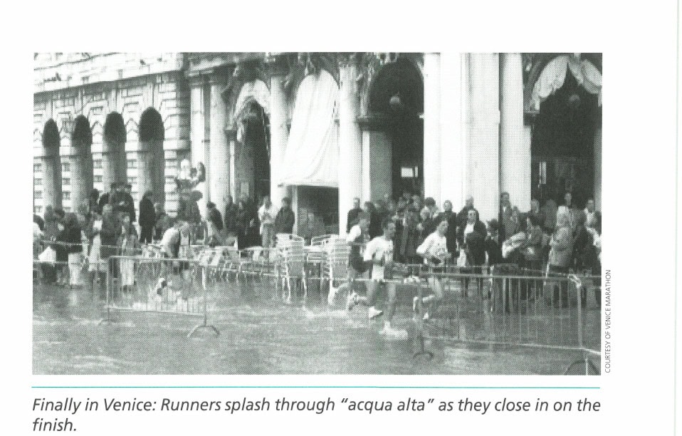 That Sinking Feeling 6 Finally in Venice: Runners splash through "acqua alta" as they close in on the finish.