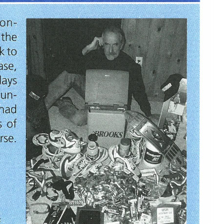 Jerry surrounded by the gear and supplies needed to support his 200-marathon quest.