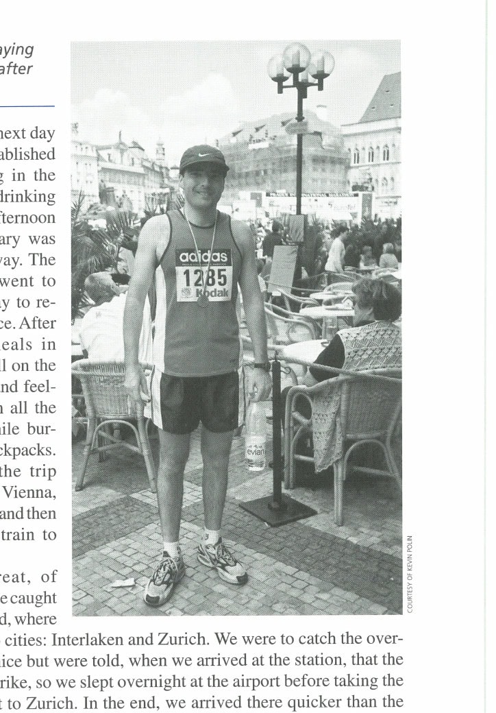Kevin proudly displaying his finisher's medal after the race.