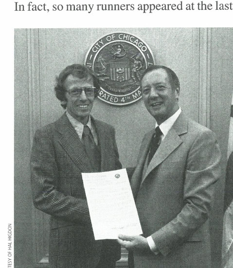 Chicago Turns 25 11 Hal Higdon (left), with then Mayor Michael Bilandic, receiving a proclamation for his help in making the First Annual Mayor Daley Marathon a success.