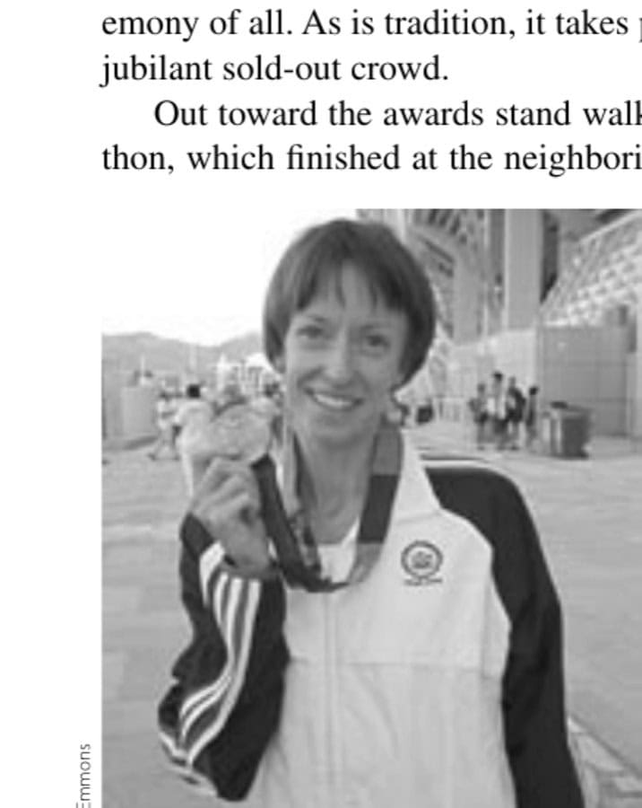 They Practice On Mountains 19 Deena after the medal ceremony in Athens.