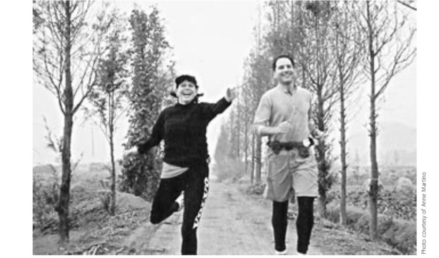 The author running in Shanghai with Peter Neumann.