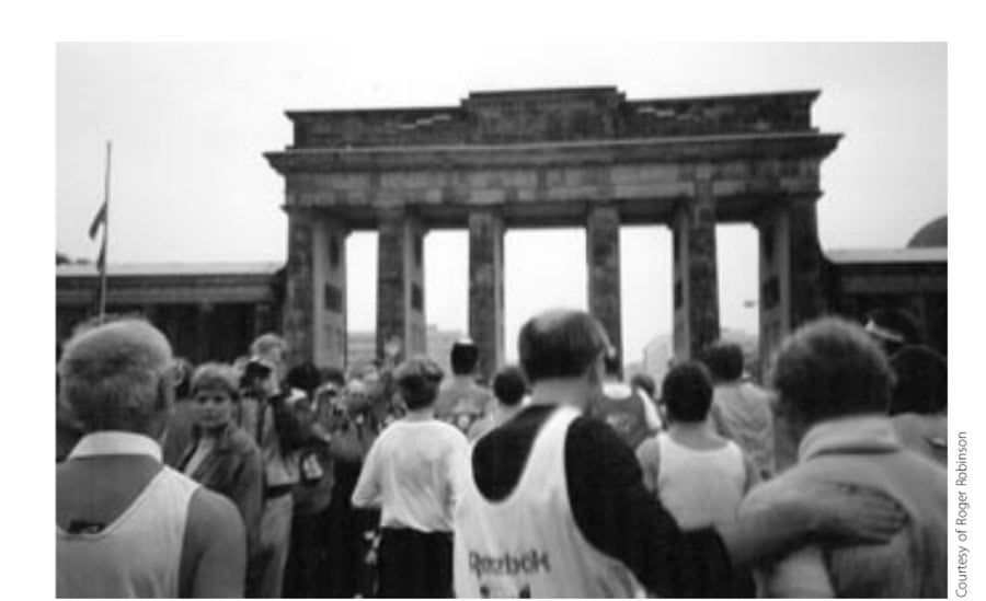 Outrunning The Sound Of The Doodlebug 15 "Embrace, ye millions." International runners approach the Brandenburg Gate.