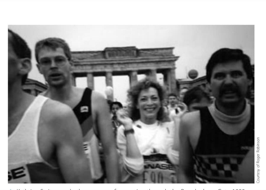 Outrunning The Sound Of The Doodlebug 12 Kathrine Switzer and other runners after passing through the Brandenburg Gate. 1990
