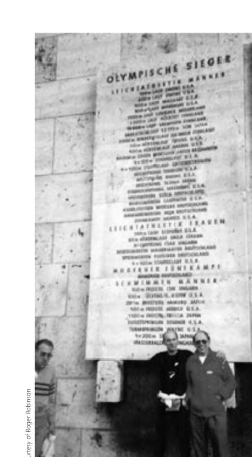 Outrunning The Sound Of The Doodlebug 14 Author Roger Robinson with 1956 Olympic gold medalists Chris Brusher (who died in 2003) at the memorial to 1936 Olympic Champions, Berlin Olympic Stadium.