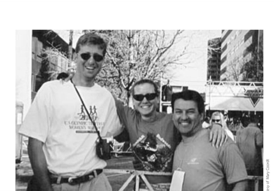 My Most Unforgettable Marathon: March/April 2005 15 The author on race morning mugs with her brother, Kevin (left) and her husband, Dave.