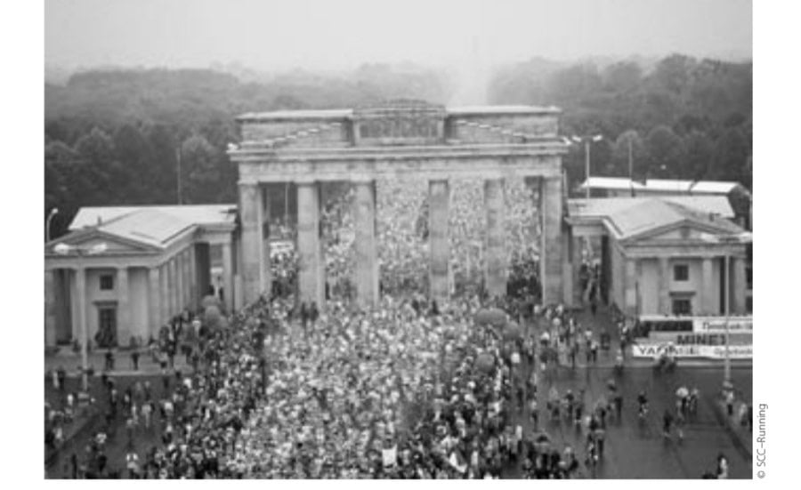 Reunification 1990—the first time runners from East and West Germany could pass the famous Brandenburg Gate.