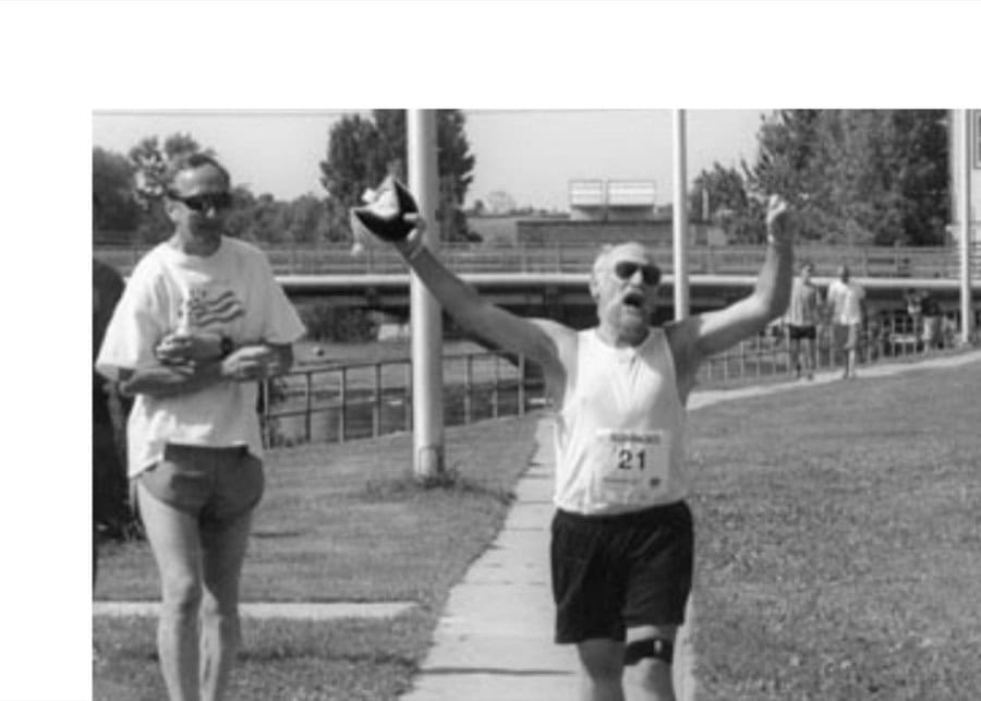 The finish—at last. At the left is another hometown pal, Bill Amberman, who waited for me to come in, almost four hours after he finished the half.