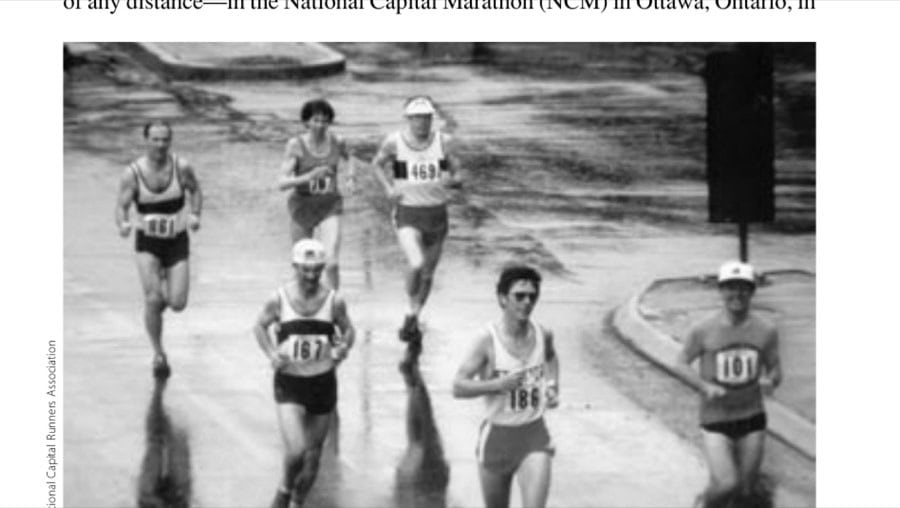 The author (middle runner, back row) in the last miles of the National Capital Marathon in May 1980, in the pouring rain, on her way to a 2:52:51.