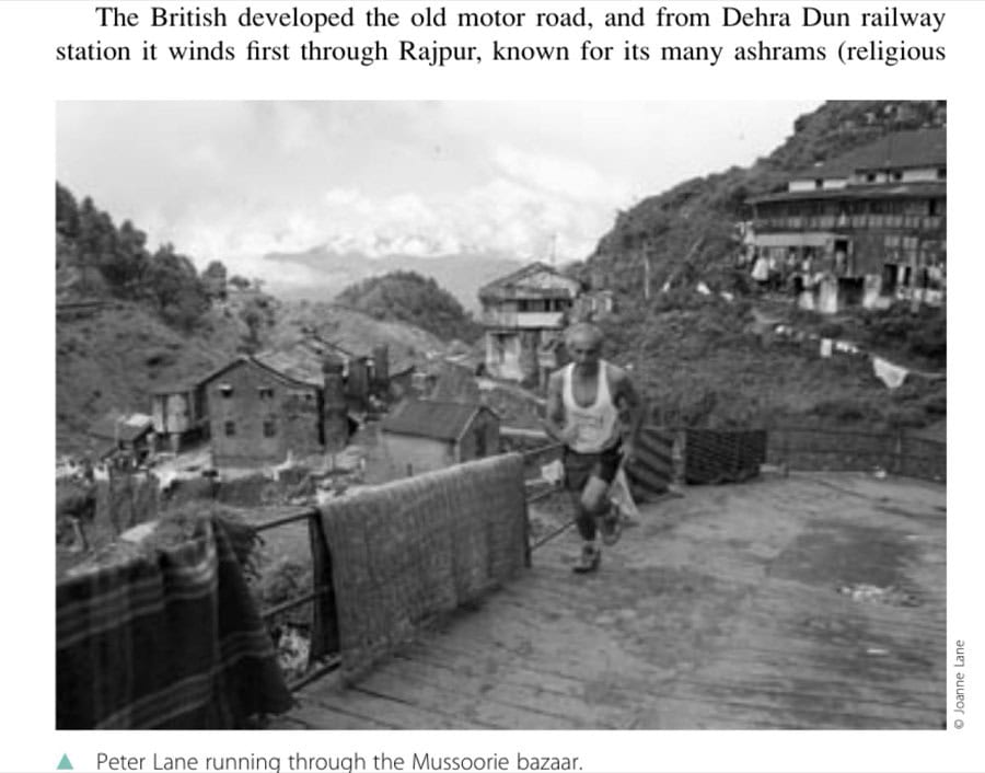 Peter Lane running through the Mussoorie bazaar.