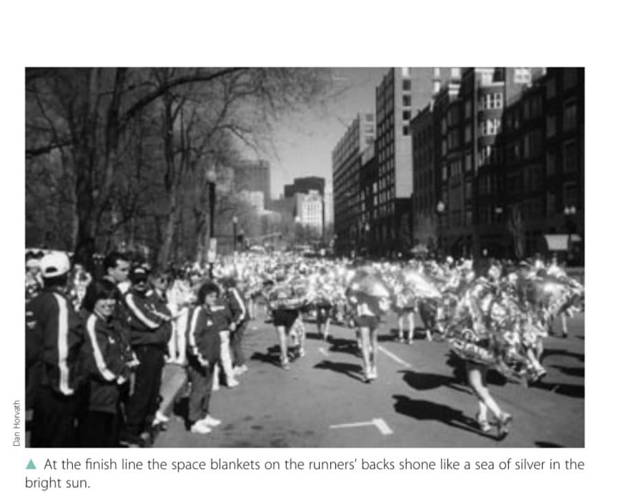 Running's Woodstock 12 At the finish line the space blankets on the runners' backs shone like a sea of silver in the bright sun.