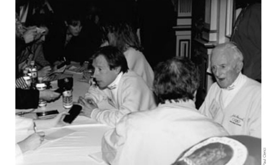 Bill Rodgers (center), Kim Jones (next to him), and Johnny A. Kelley at a press conference.