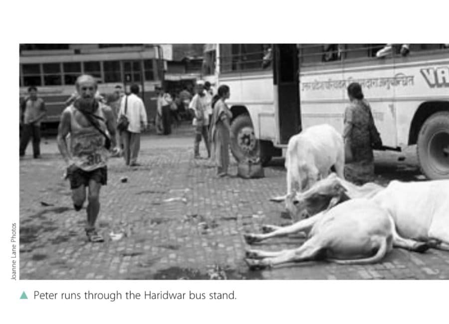 Peter runs through the Haridwar bus stand.