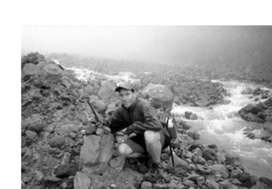 When the going gets tough, the tough follow . . . cairns. With visibility at a minimum and the trail hard to follow in spots, McQuaide and Kardong have to rely on stacks of rocks left by hikers.
