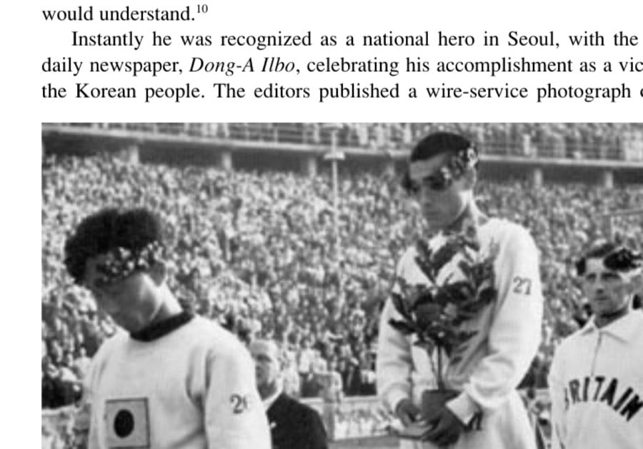 The Naziolympics 15 On the victory stand, from left, are bronze medalist Nam Sung-yong, gold medalist Sohn Kee-chung, and silver medalist Ernie Harper.