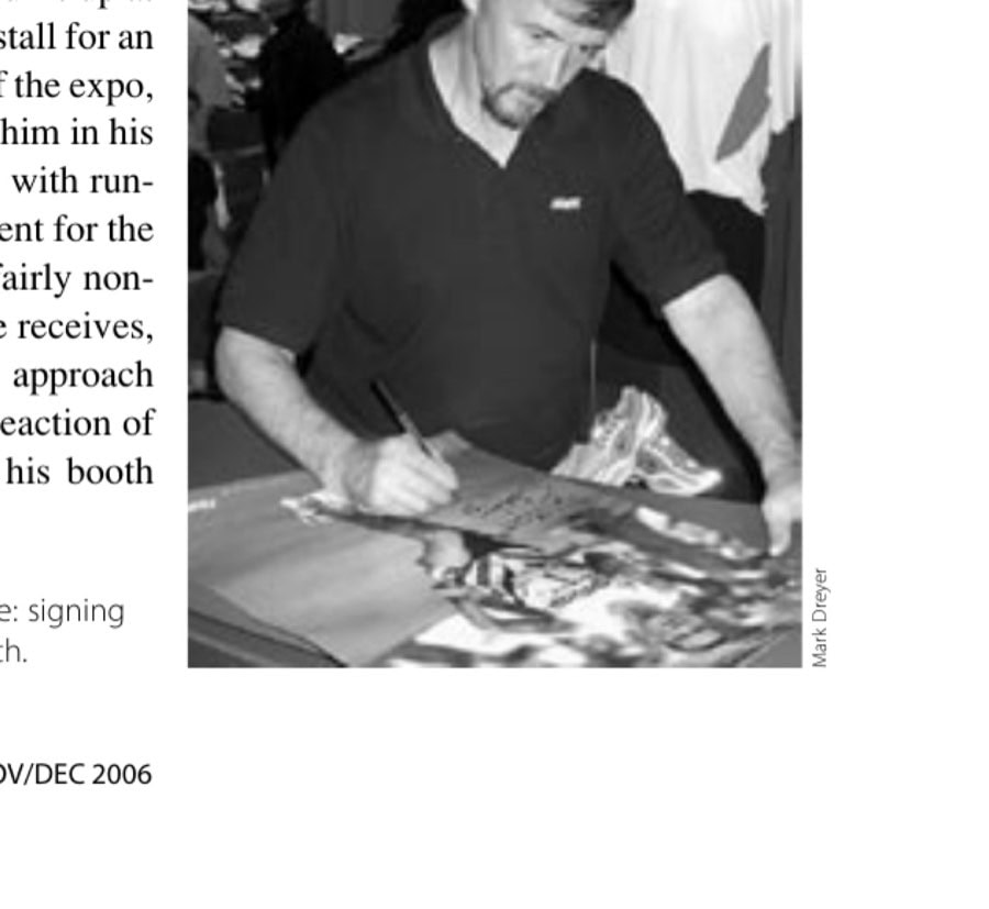 Steve Jones in his current role: signing posters at the Reebok expo booth.