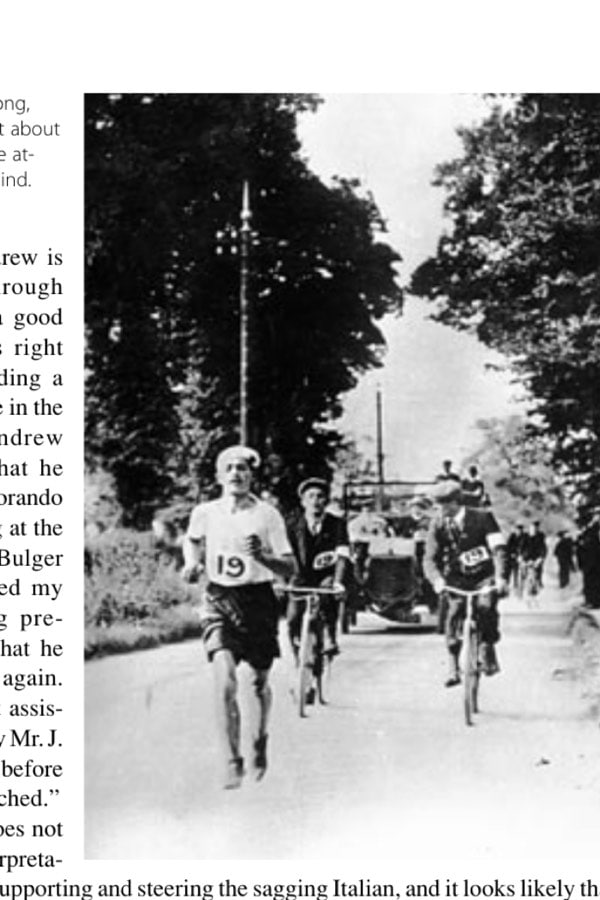 Pietri going strong, chasing Hefferon at about 20 miles, his bicycle attendants close behind.