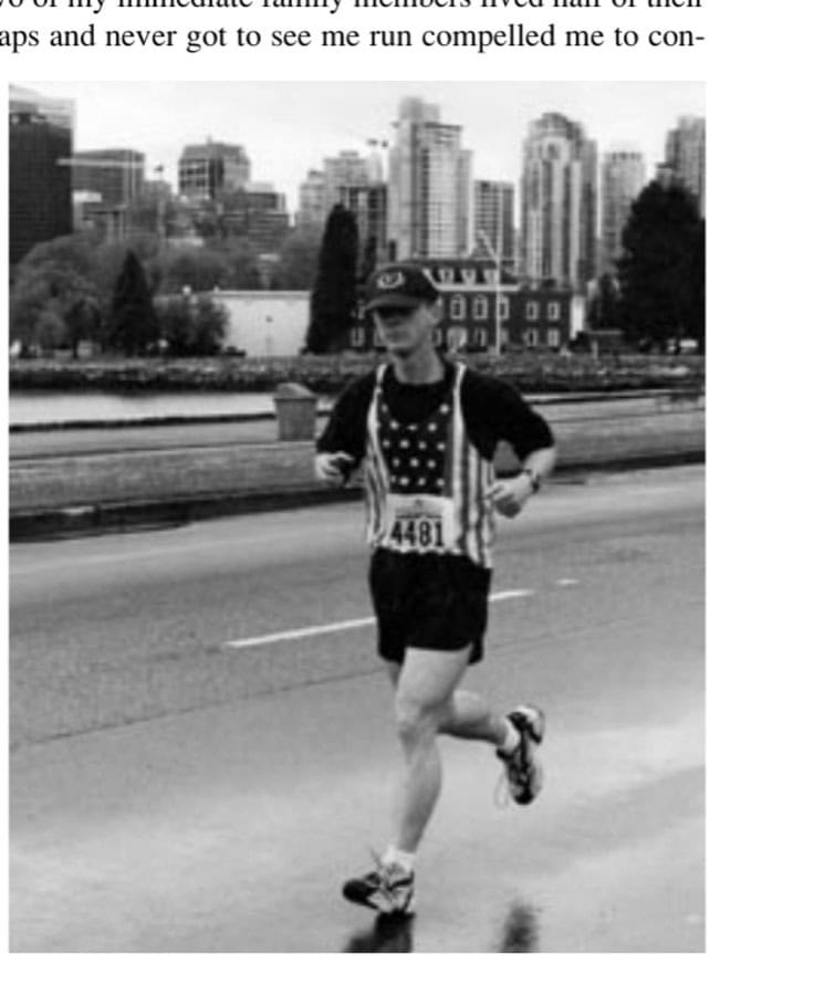 Eddie displays his patriotism while marathoning in Vancouver, British Columbia, in May 2002.