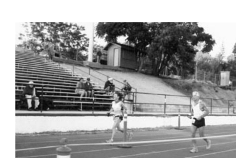 Rachel Toor and the author approach the finish line at Auburn.