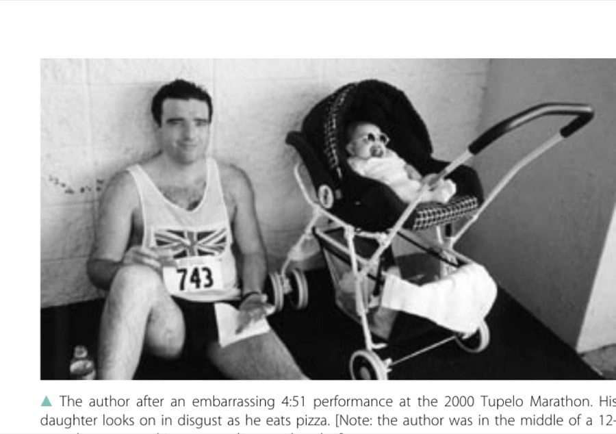 The author after an embarrassing 4:51 performance at the 2000 Tupelo Marathon. His daughter looks on in disgust as he eats pizza. [Note: the author was in the middle of a 12-marathon year and it was 100 degrees that day.]