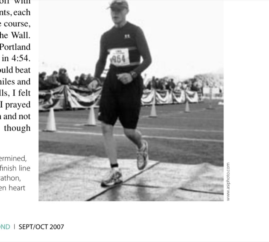 Dehydrated but determined, the author crosses the finish line of the 2005 Seattle Marathon, seven months after open heart surgery.