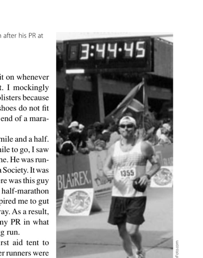 The author's self-satisfied grin after his PR at the Mardi Gras Marathon.