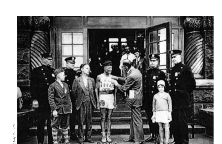 Johnny Salo receives his commission as a Passaic, New Jersey, police officer, as son, Leo (left), and daughter, Helen (right), look on.