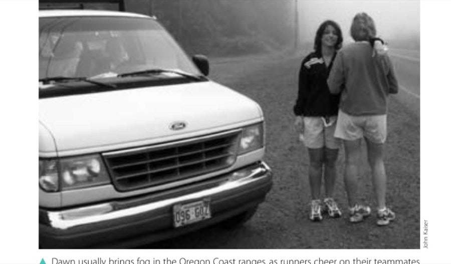 Dawn usually brings fog in the Oregon Coast ranges, as runners cheer on their teammates or supply water along the roadside of each leg.
