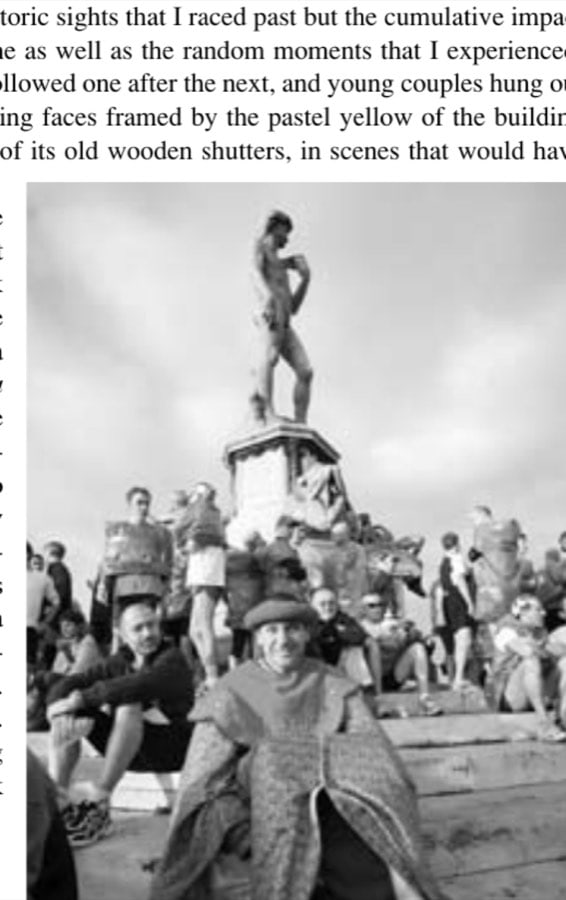 Runners rest and enjoy the breathtaking views near the bronze copy of Michelangelo's famous sculpture, David.