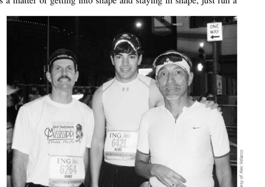 Taking Laziness The Distance 8 Alec (center) with dad Andy (to his right) and Mike Smith at the ING Georgia Marathon in 2007.