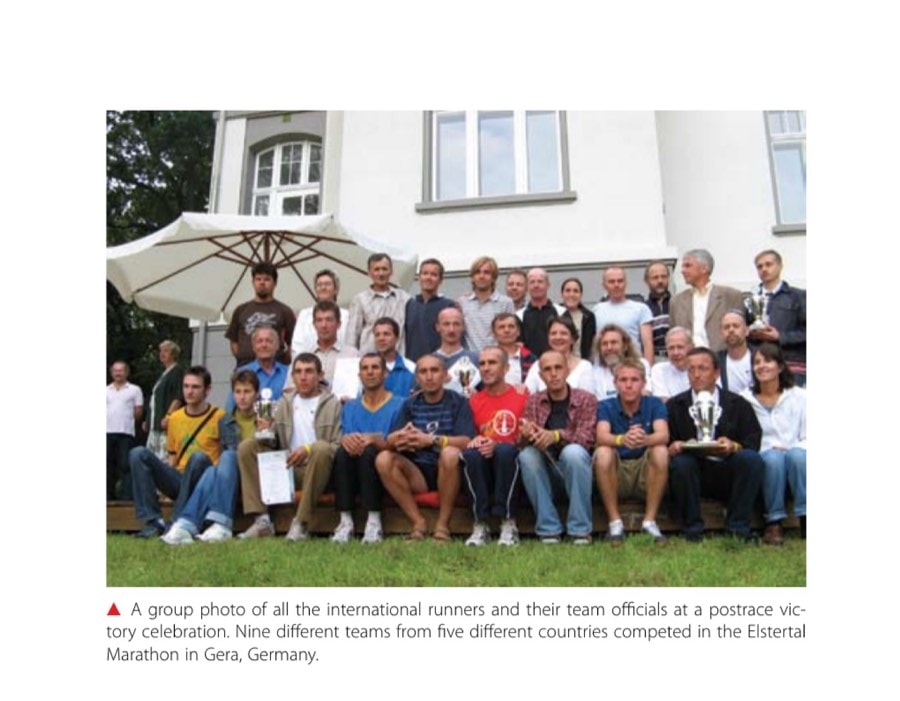 Really International Marathon 12 A group photo of all the international runners and their team officials at a postrace victory celebration. Nine different teams from five different countries competed in the Elstertal Marathon in Gera, Germany.