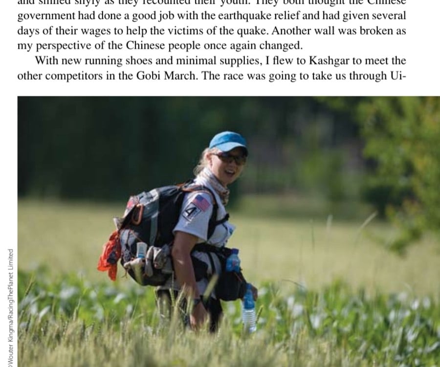 The author walking through a Uighur village during the 2008 Gobi March in China.