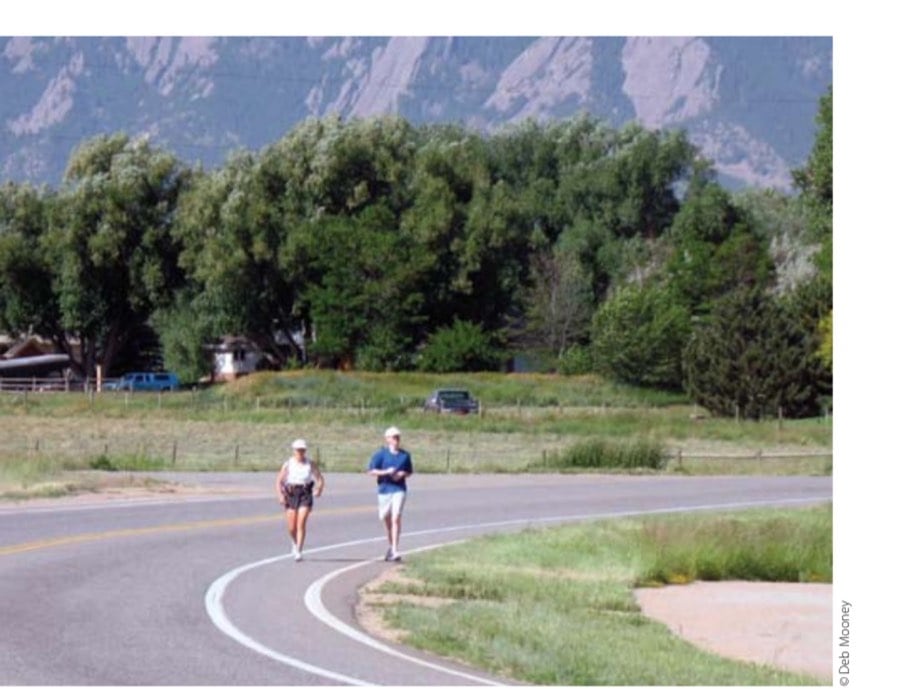 Paula and son Paul running eastward up and out of the Boulder valley.