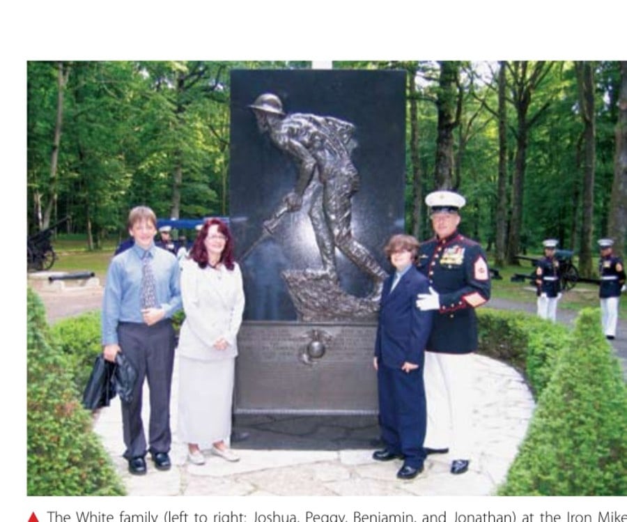 The White family (left to right: Joshua, Peggy, Benjamin, and Jonathan) at the Iron Mike memorial, Belleau Woods, France. Memorial Day, 2008.