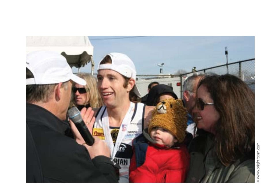 A family affair: Wardian, after winning the National Marathon, with wife Jennifer and son Pierce.