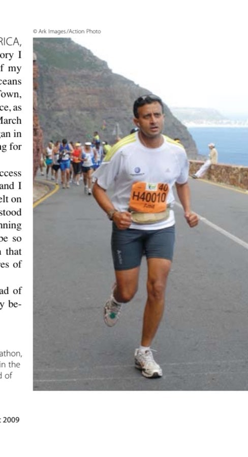 Two years after running his first marathon, the author cruises up Chapman's Peak in the Two Oceans Ultra, itching to run ahead of the pacer group (seen behind him).